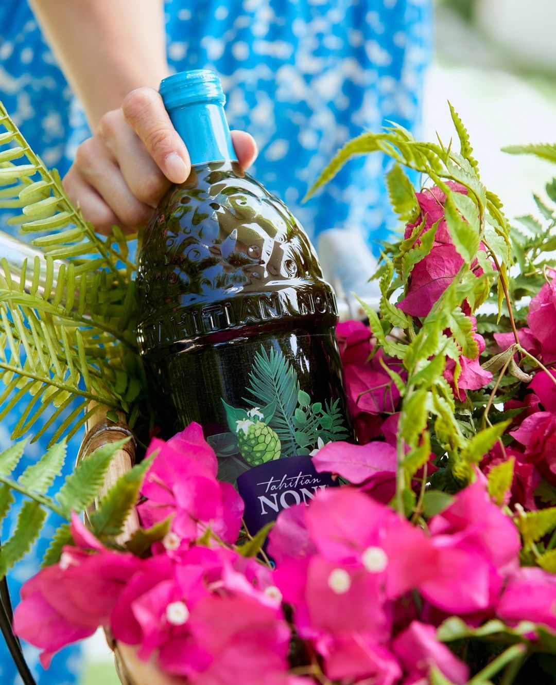 Tahitian Noni Juice with flower assortment